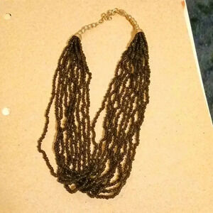Beautiful beaded necklace..color black. SMALL